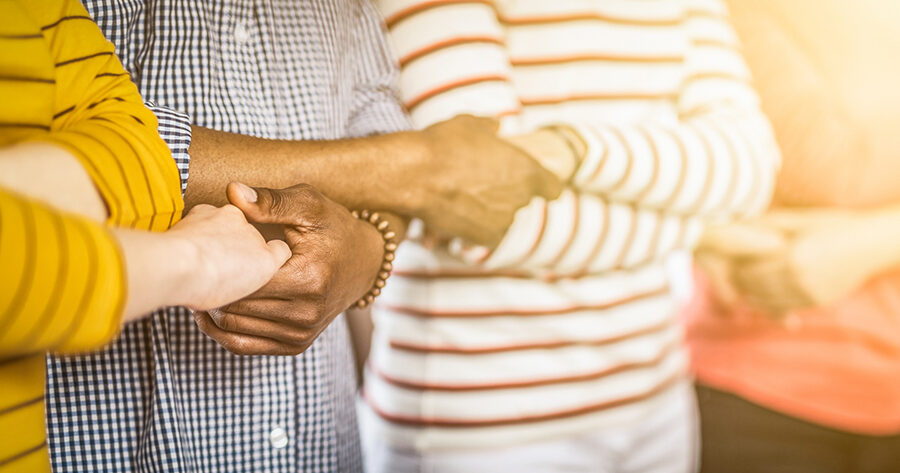Unity and teamwork concept. stock image of people holding hands
