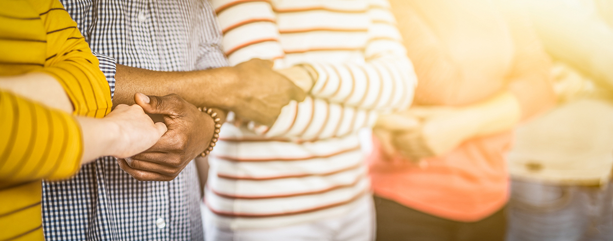 Unity and teamwork concept. stock image of people holding hands